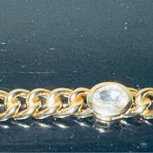 White Topaz 14k gold over silver, small bracelet. Lobster claw .